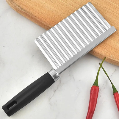 Coupe frite manuel avec lame dentelée