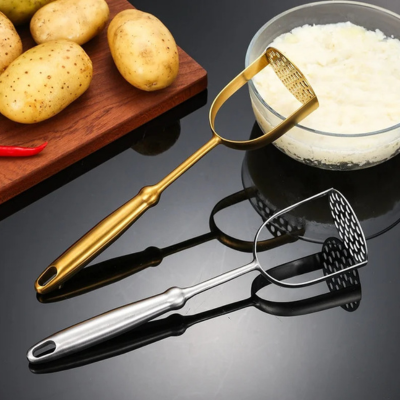 Presse purée inox manuel dorée et argentée