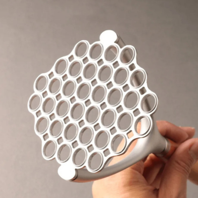 Presse purée manuel à trous fins en nid d'abeille