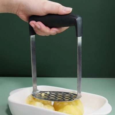 Presse-purée pour pommes de terre et légumes