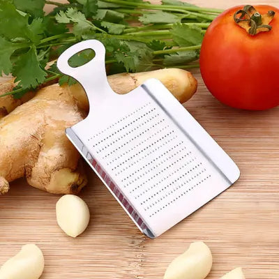 Râpe a ail et gingembre en inox
