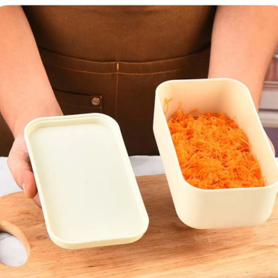 Râpe à fromage avec récipient et couvercle facile à utiliser