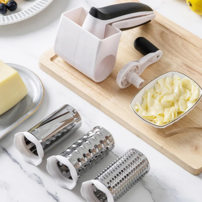 Râpe  à fromage  manivelle avec trois tambours interchangeables en acier inoxydable