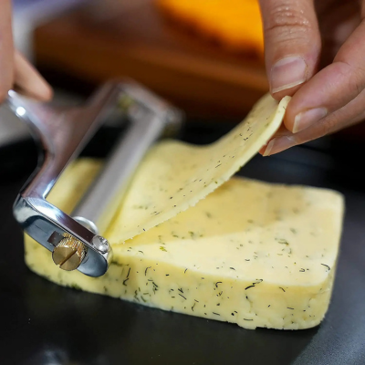 Trancheuse à fromage manuelle avec un file Adjustable pratique