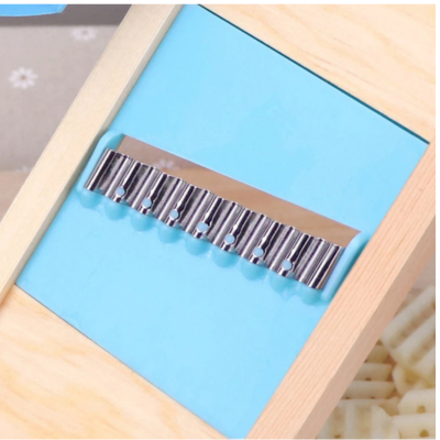 Vue d'ensemble du coupe-frite montrant sa structure robuste et ergonomique