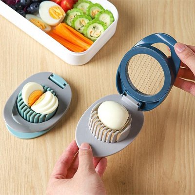 Coupe oeuf Système à double grille